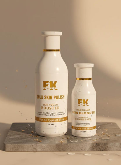 Two bottles of FK Gold Skin Polish on a stone surface with a neutral background